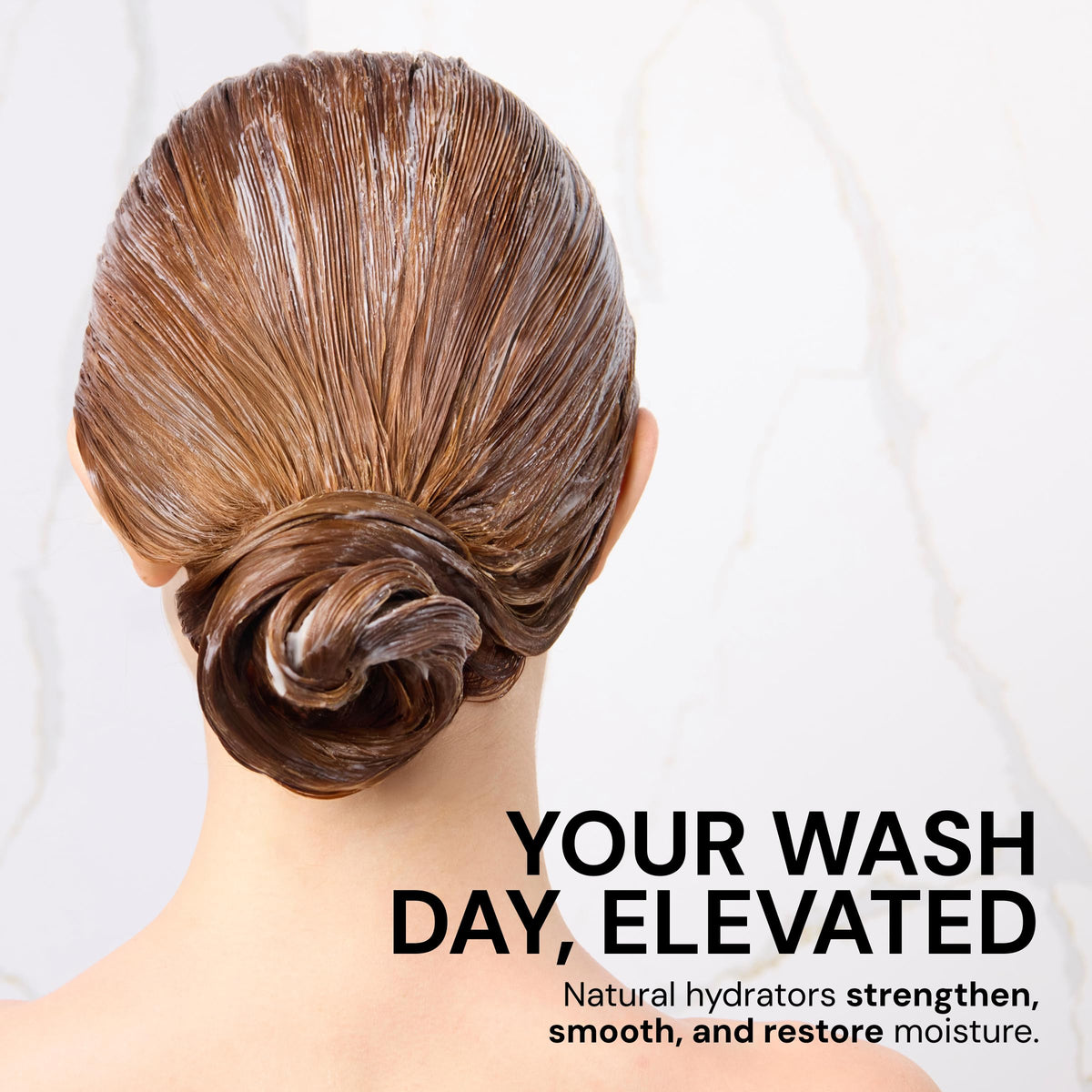 L'ANGE HAIR conditioner being rinsed in shower demonstrating smooth detangling