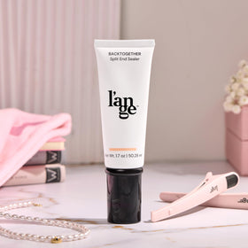 L'ANGE HAIR on bathroom shelf lifestyle shot showing everyday routine convenience benefit