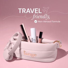 L'ANGE HAIR in a handbag demonstrating quick touch-ups on the go