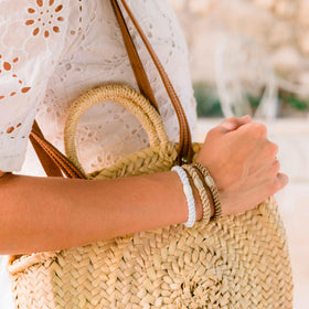 L. Erickson stack of bands on a hand, visibly durable and easy to grab quickly