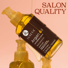 L LUSETA poured drop of argan oil close-up highlighting silky texture and hydration
