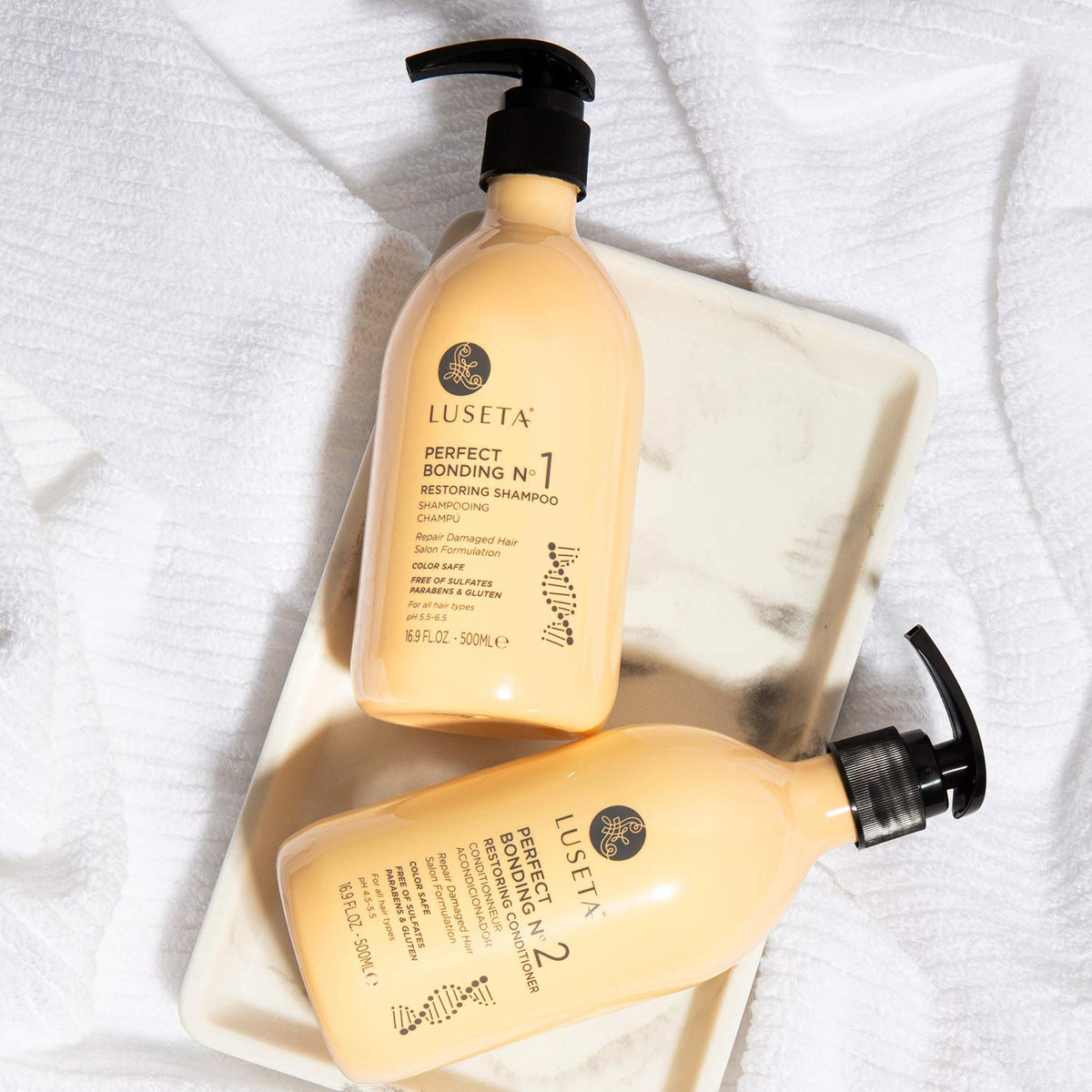 l luse ta rosemary and quinoa flatlay highlighting botanical and amino-acid benefits