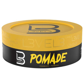 L3 pomade used in front of mirror showcasing polished everyday styling