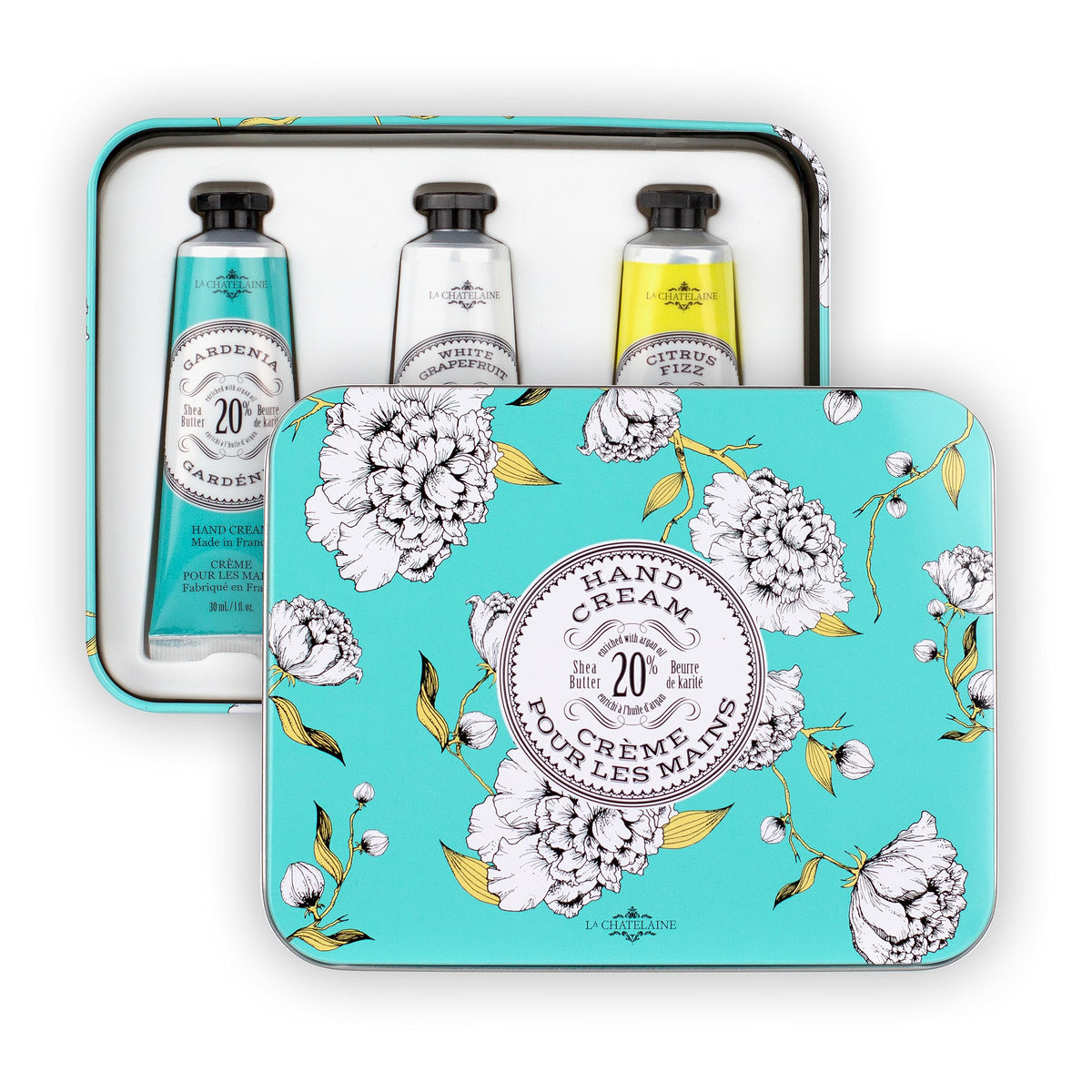 La Chatelaine tin beside a passport to show travel-friendly compact size and convenience