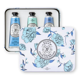 La Chatelaine tins styled in a gift setting showing elegant presentability