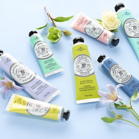 La Chatelaine travel purse shot with tin slipped into a pocket for on-the-go hydration benefit