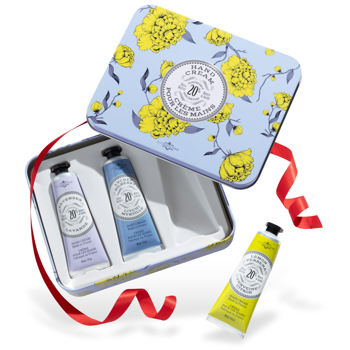 La Chatelaine trio front tin showing three travel hand creams, ideal for gifting