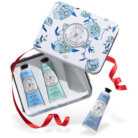 La Chatelaine front packaging showing the ready-to-gift tin and trio benefit