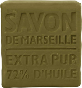 Hand holding La Compagnie de Provence 400g olive cube to show scale and long-lasting value