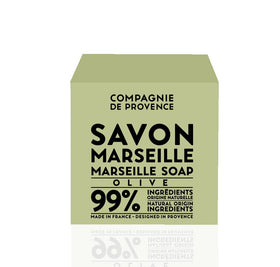 Close-up of La Compagnie de Provence olive cube texture highlighting dense lather and pure ingredients benefit