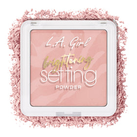 L.A. Girl powder being applied with brush demonstrating blur effect and even coverage benefit