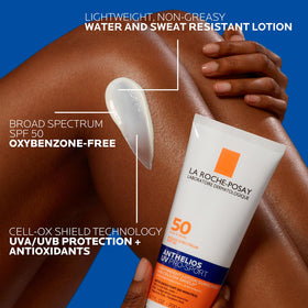 La Roche-Posay applying sunscreen to shoulder showing body use for active sports