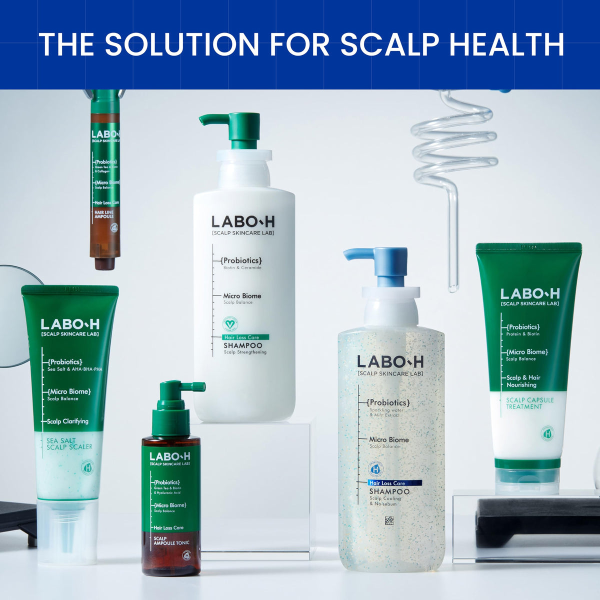LABO-H bottle held in hand to show 13.5 fl oz size and travel-friendly benefit