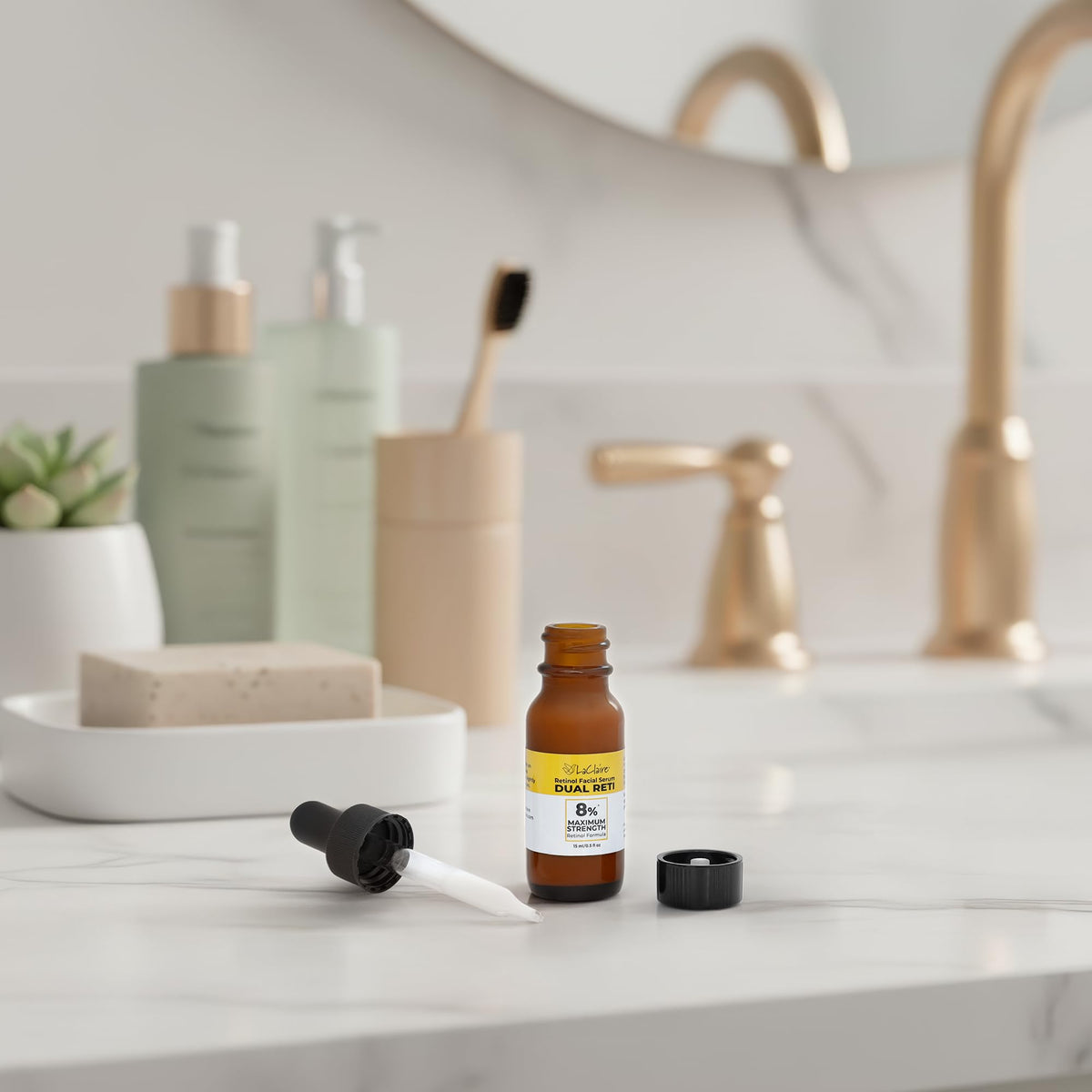 LaClaire bottle in hand for scale showing 15ml travel-friendly convenience benefits
