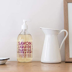 La Compagnie de Provence refill pour into glass bottle demonstrating refillable benefit
