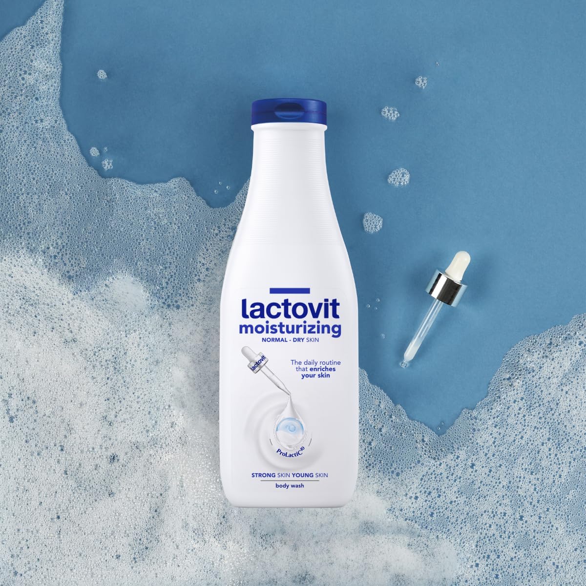 Lactovit being applied to hand in shower to show gentle cleansing benefit