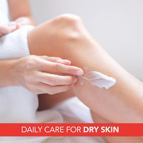 Lactovit lotion spread on arm highlighting immediate skin comfort and moisture