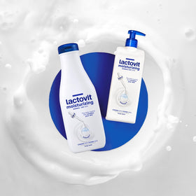 Lactovit next to hand to show scale and generous 600 ml bottle size benefit