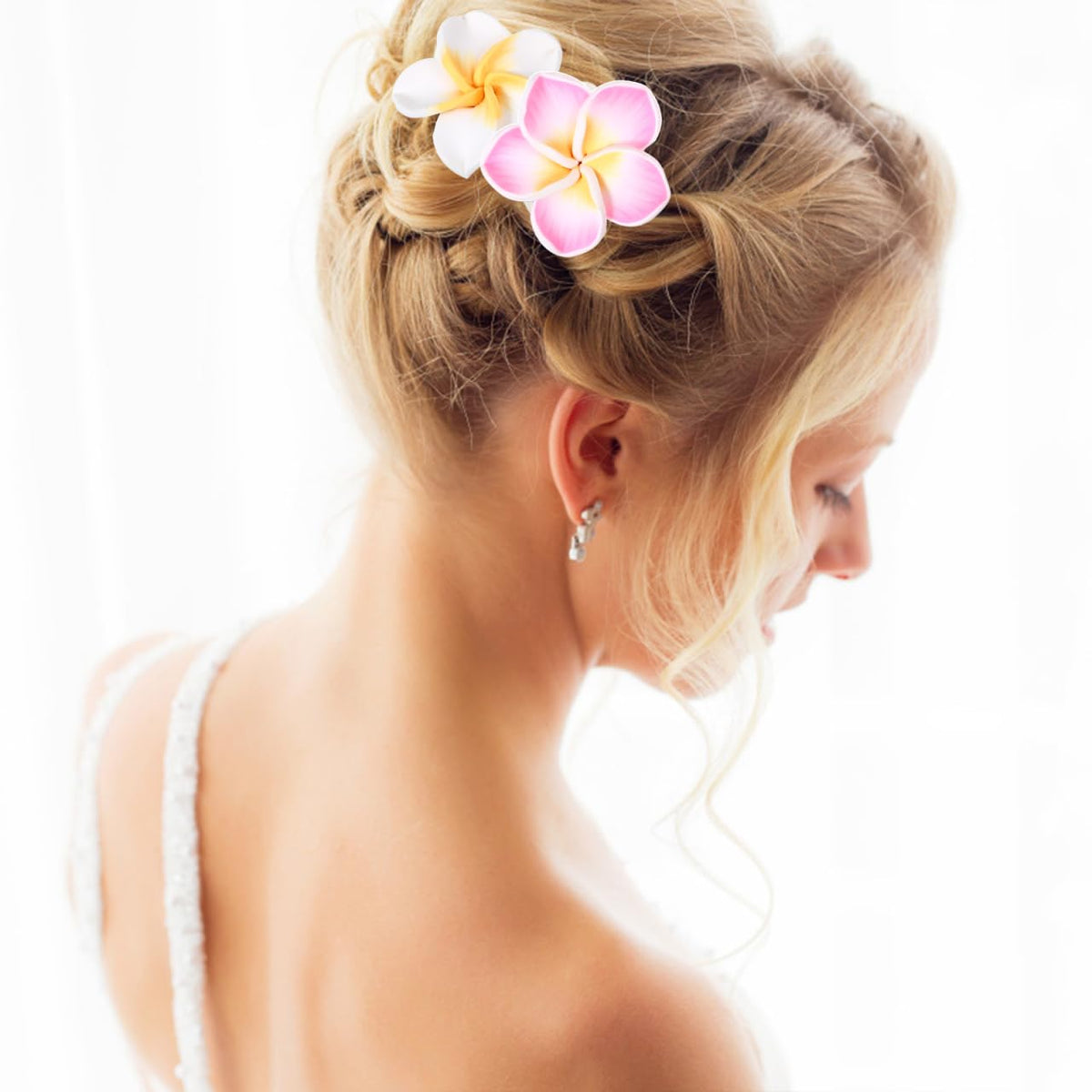 LALAFINA close-up of plumeria flower detail highlighting soft fabric and gentle hold