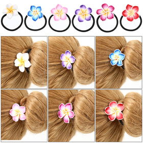 LALAFINA ponytail in use demonstrating secure hold and decorative tropical look