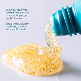 Lancer applying cleanser to wet face demonstrating effective results
