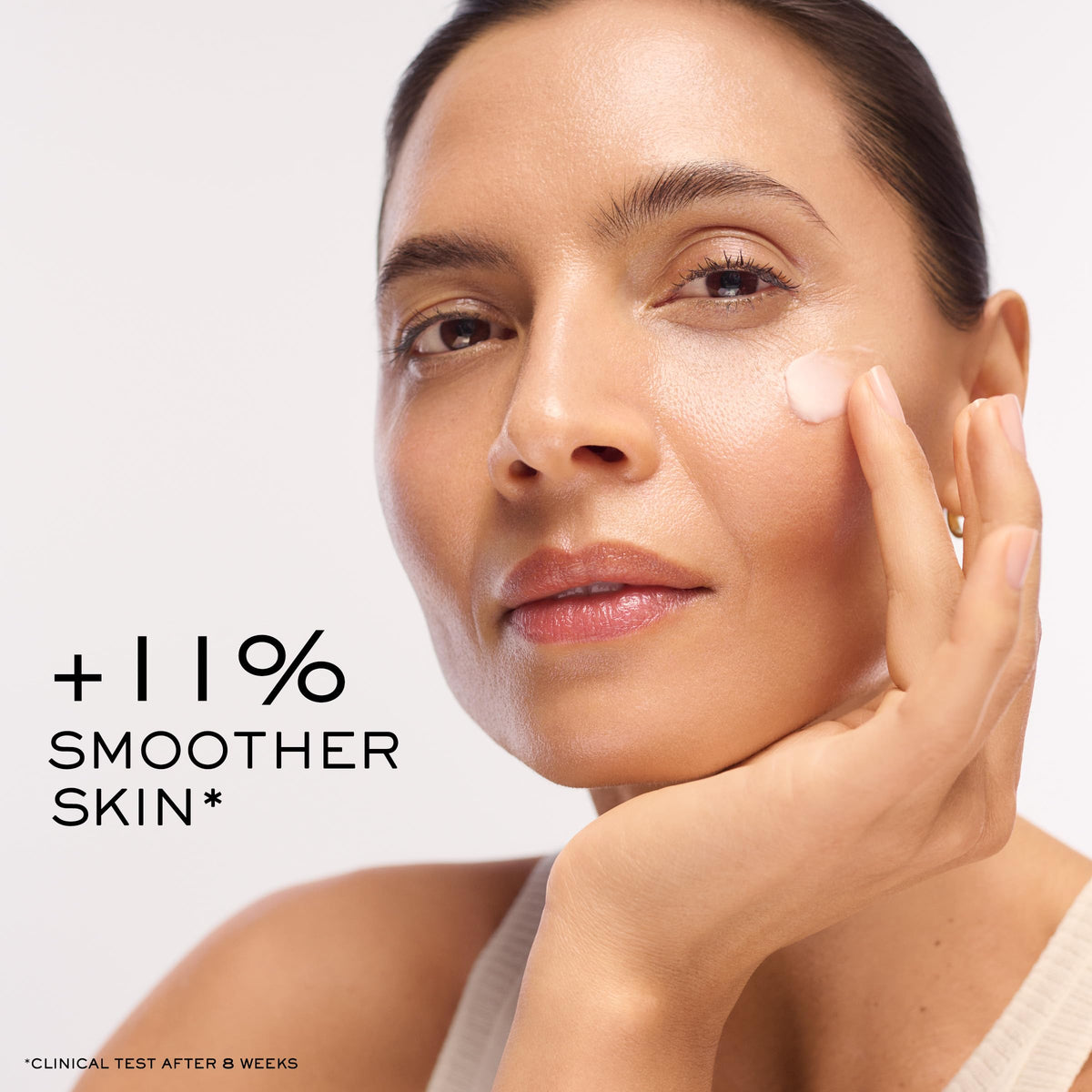 Lancôme Absolue cream texture close-up on spoon showing rich hydrating consistency