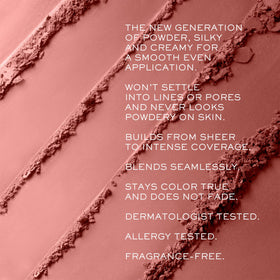 Lancôme brush close-up with powder texture highlighting silky blendability benefit