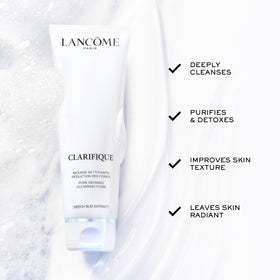 Lancôme Clarifique bottle held in hand for scale to show 4.2 fl oz practical size