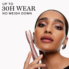 Lancôme mascara swatch on skin showing rich black texture and clump-free finish benefit