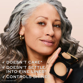 Lancôme Dual Finish in a makeup bag showing travel-friendly convenience benefit