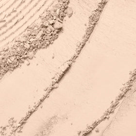 Lancôme powder texture close-up highlighting smooth, blendable finish benefit