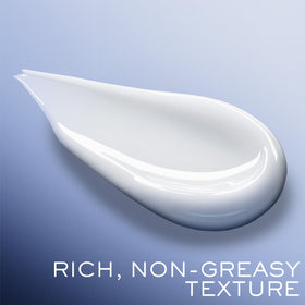 Lancôme next to a hand to show scale and travel-friendly size