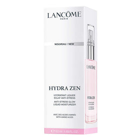 Lancôme jar next to a palm for scale showing travel-friendly 1.7 fl oz convenience