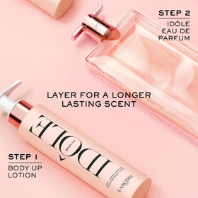 Lancôme Idôle lotion poured onto palm showing smooth moisturizing consistency