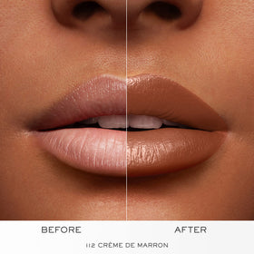 Lancôme lipstick in hand for scale showing true size and travel-friendly convenience