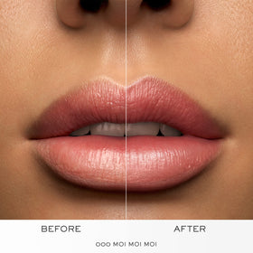 Lancôme lipstick held in hand to show actual size and travel-friendly scale