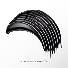 Lancôme mascara next to ruler showing compact size and travel-friendly convenience
