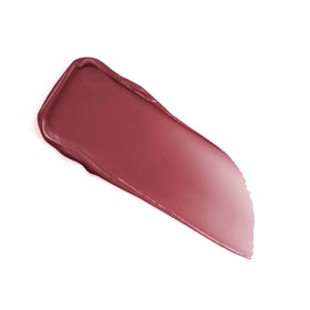 Lancôme beside a coin to show compact size and portability benefit