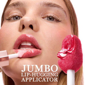 Lancôme lip swatch 60 Million Dollar Berry showcasing rich berry shine and hydration