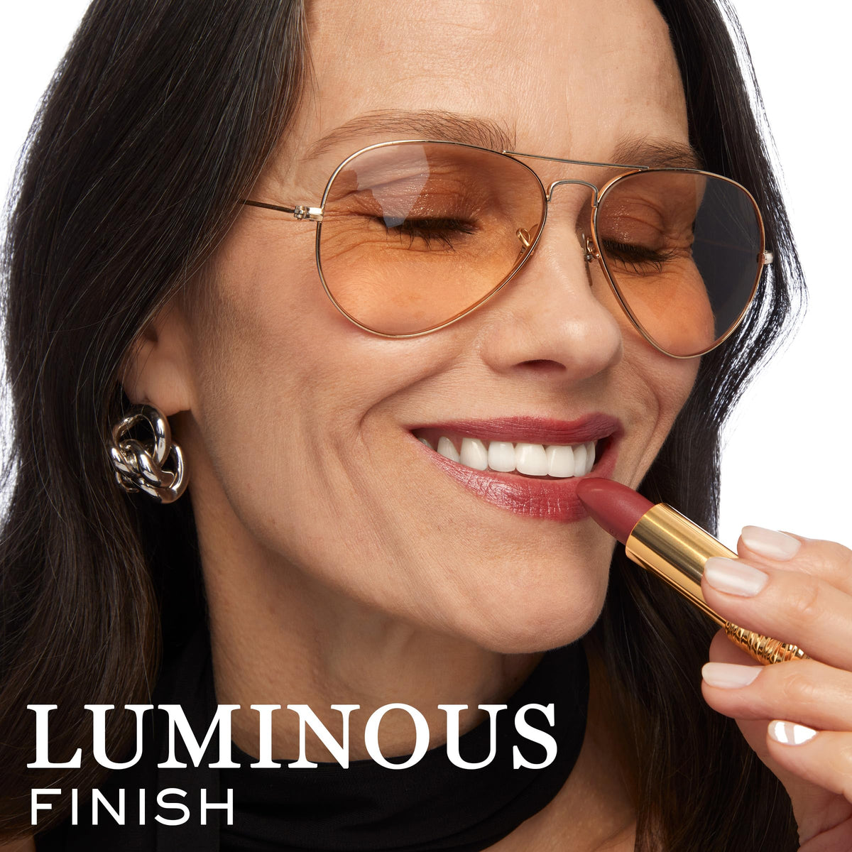Lancôme lipstick placed in evening setting suggesting wearable elegance for events