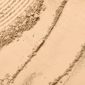 Lancôme powder close-up highlighting smooth texture and blendability benefits