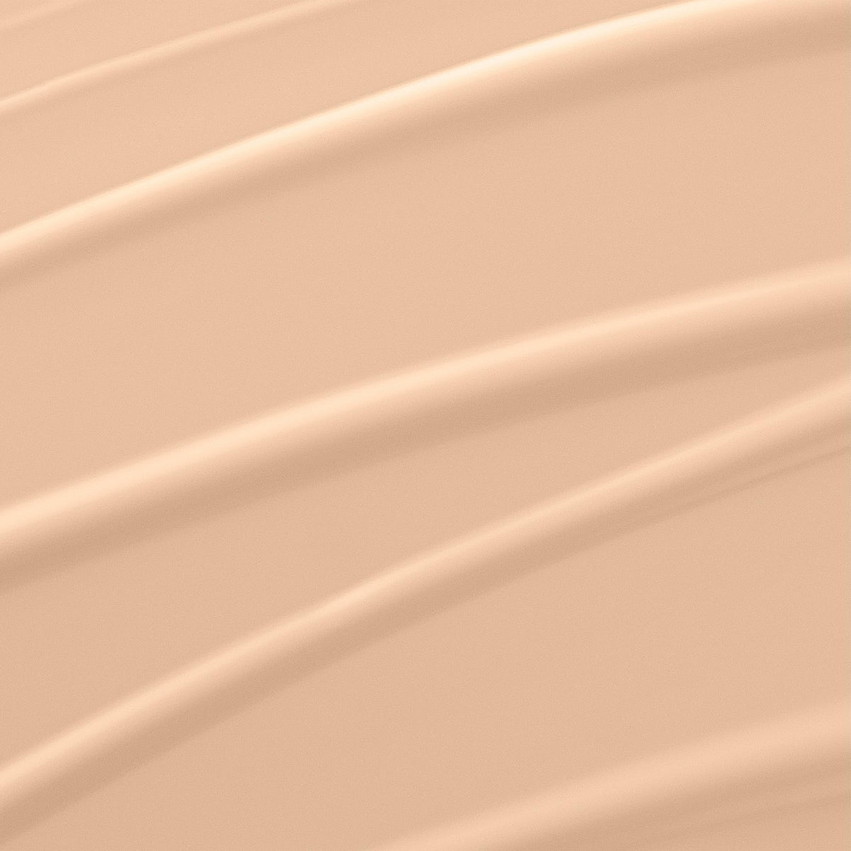 Lancôme foundation texture dispensed on hand demonstrating hydrating, lightweight finish