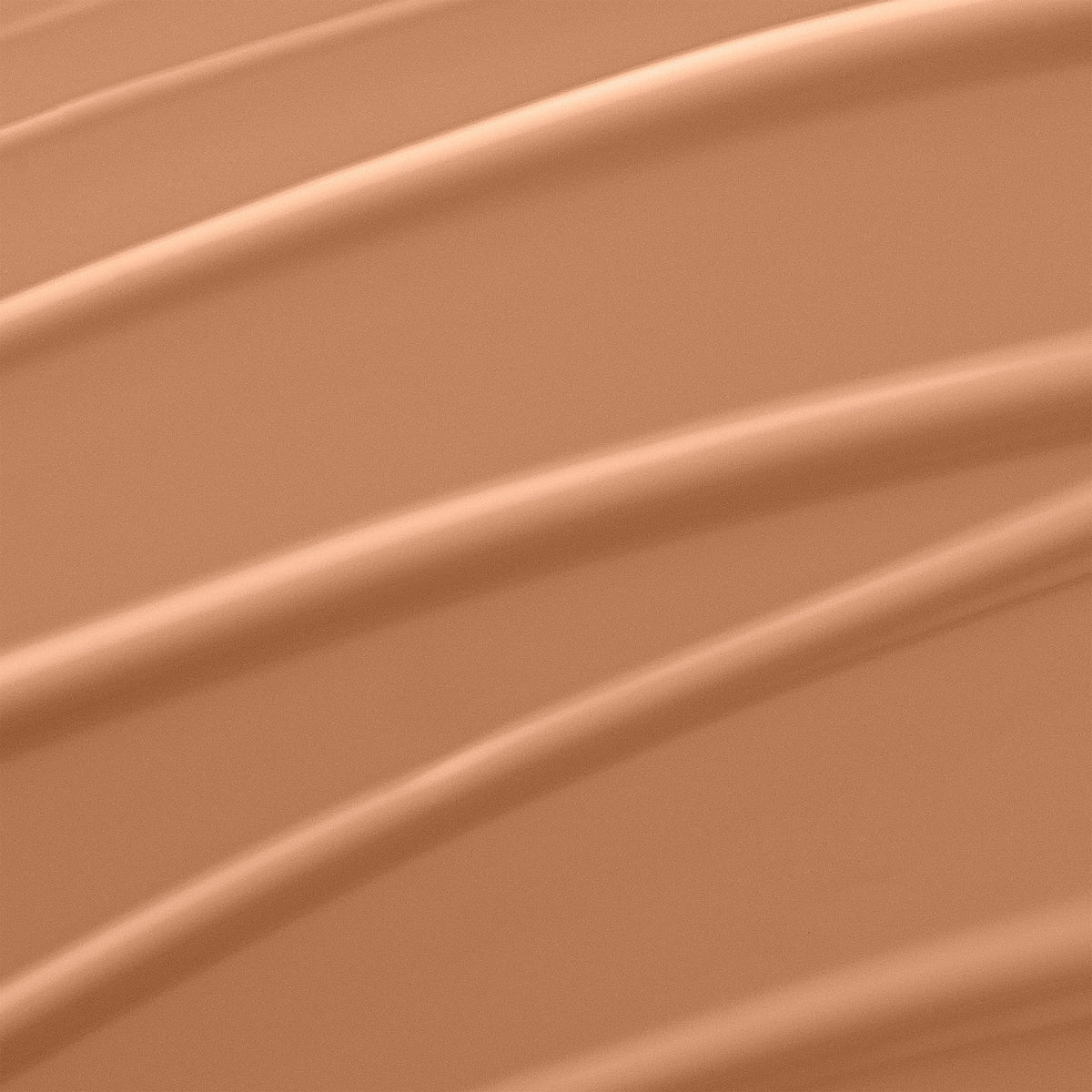 Lancôme shade 360 swirled to show medium-full coverage and color