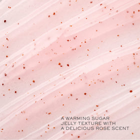 Lancôme scrub texture close-up with visible sugar grains and honey sheen demonstrating gentle exfoliation