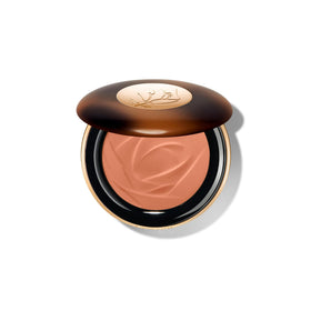 Lancôme front compact showing sleek bronzer packaging and brand luxury