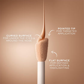 Lancôme concealer in hand to show true size and portable convenience