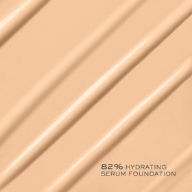 Lancôme model wearing foundation outdoors showing natural glow benefit