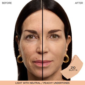 Closeup of Lancôme formula swept on skin, demonstrating smooth blendability and even coverage benefit