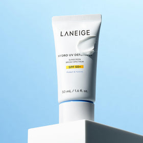 LANEIGE sunscreen spread on hand illustrating fast absorption benefit