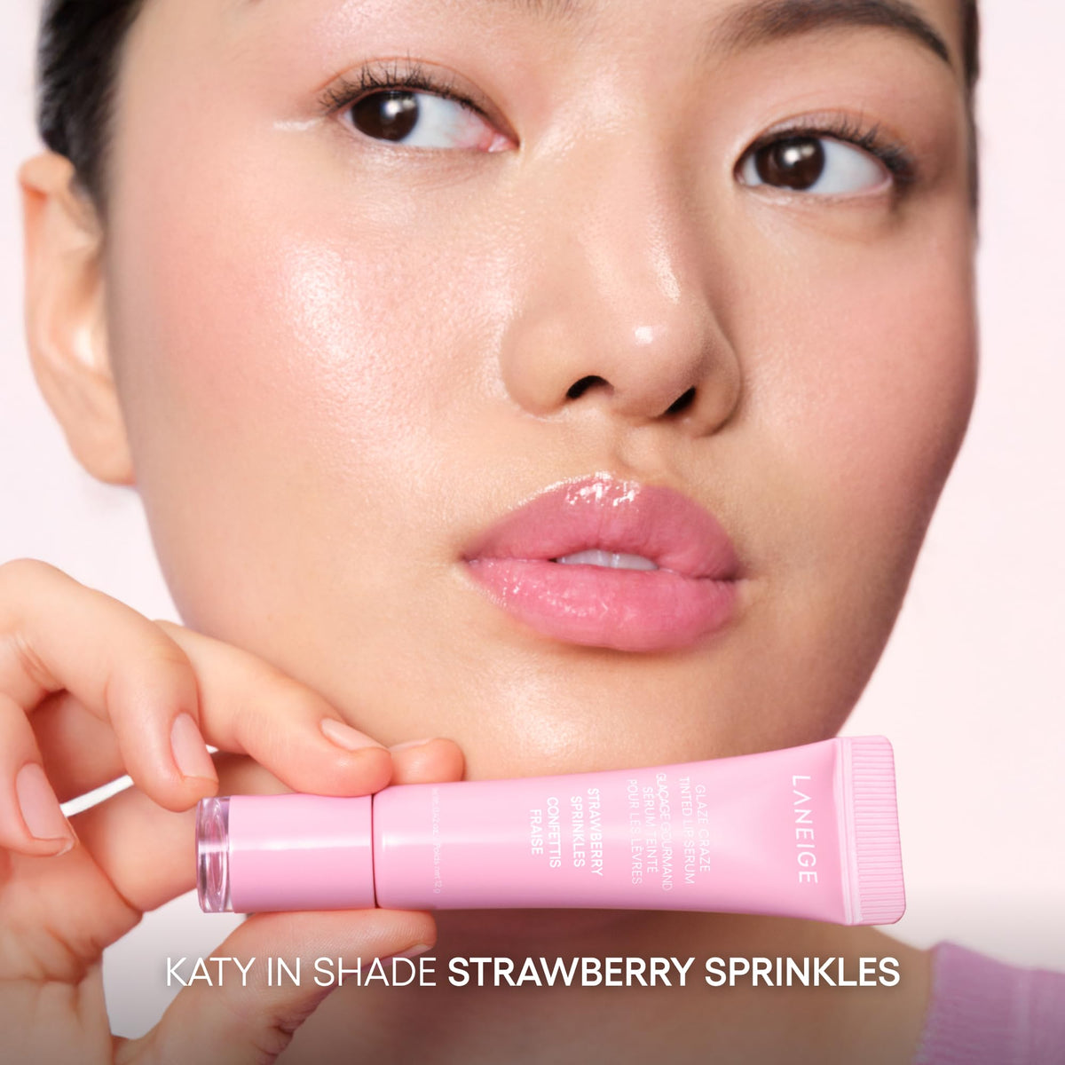LANEIGE donut keychain attached to bag showing playful accessory and portability